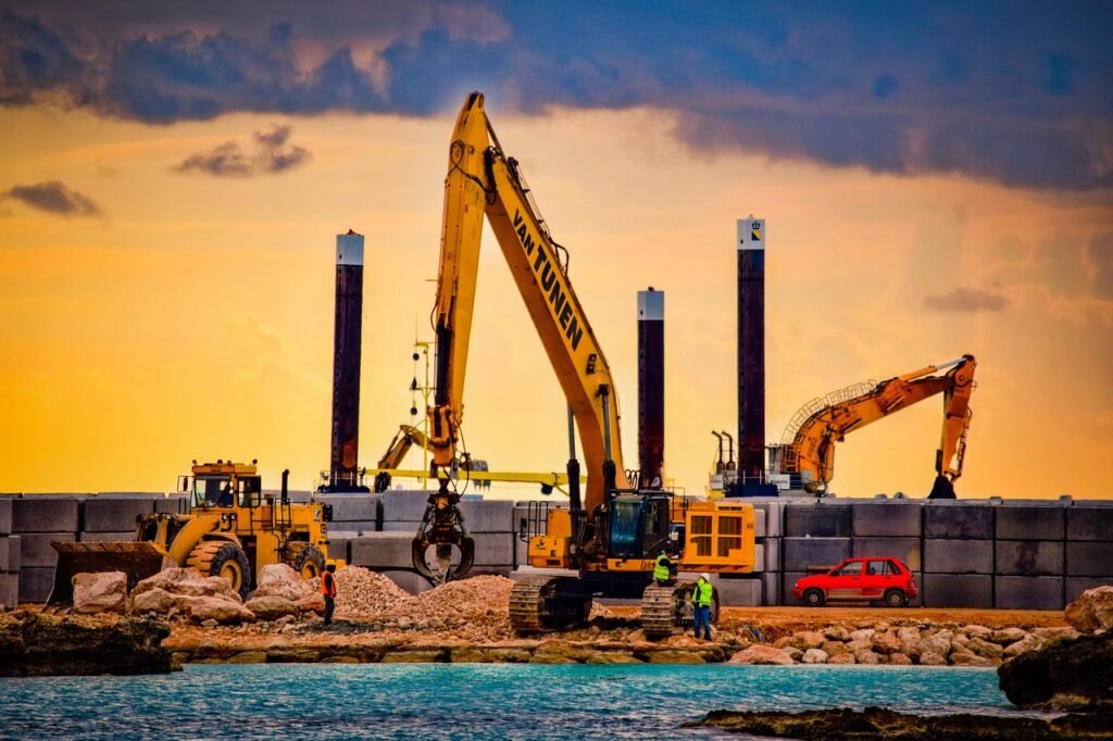 "Workers performing a thorough cleanup of a construction site, removing debris and dust to prepare the space for final use